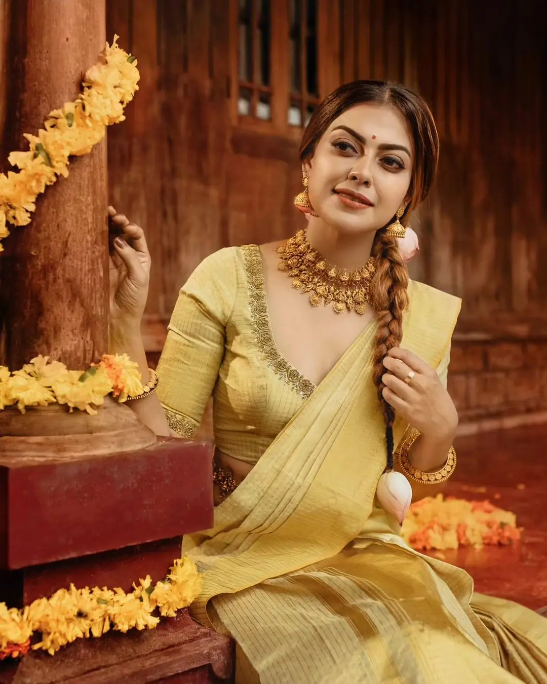 Anusree Nair Wearing Beautiful Earrings Jewellery Yellow Saree Blouse